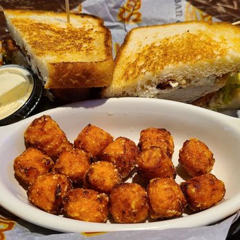Brothers Bar & Grill - Blue cheese chicken sandwich with sweet potato tots. So good! - Sports Bars Near Me - Indianapolis, Indiana