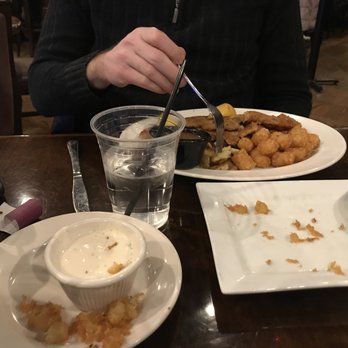 Schnell's Brauhaus - a man eating at a restaurant - German Near Me - Palatine, Illinois