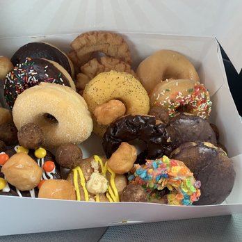 Donut Maker - Assorted dozen and two blueberry filled - Donuts Near Me - Greenwood Village, Colorado Donut Maker - Assorted dozen and two blueberry filled - Donuts Near Me - Greenwood Village, Colorado