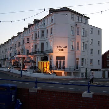 Langham Hotel - Hotel illuninated at dusk - Hotels Near Me - Eastbourne, ESX