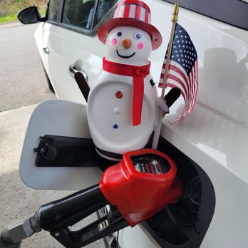 Exxon - Snowman puts gas in the car $2.69 a gallon - Gas Stations Near Me - Sevierville, Tennessee