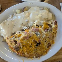 Five egg all meat omelet with gravy added to potatoes Five egg all meat omelet with gravy added to potatoes