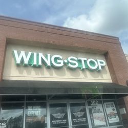 Wingstop - This place had roaches crawling on my friends while we were eating inside and we had to leave because we felt disgusted.