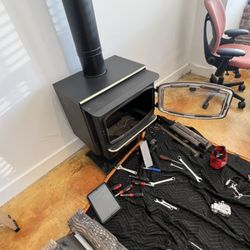 The Fireplace Repair Guys - Fixing Avalon that's burner was dropping.