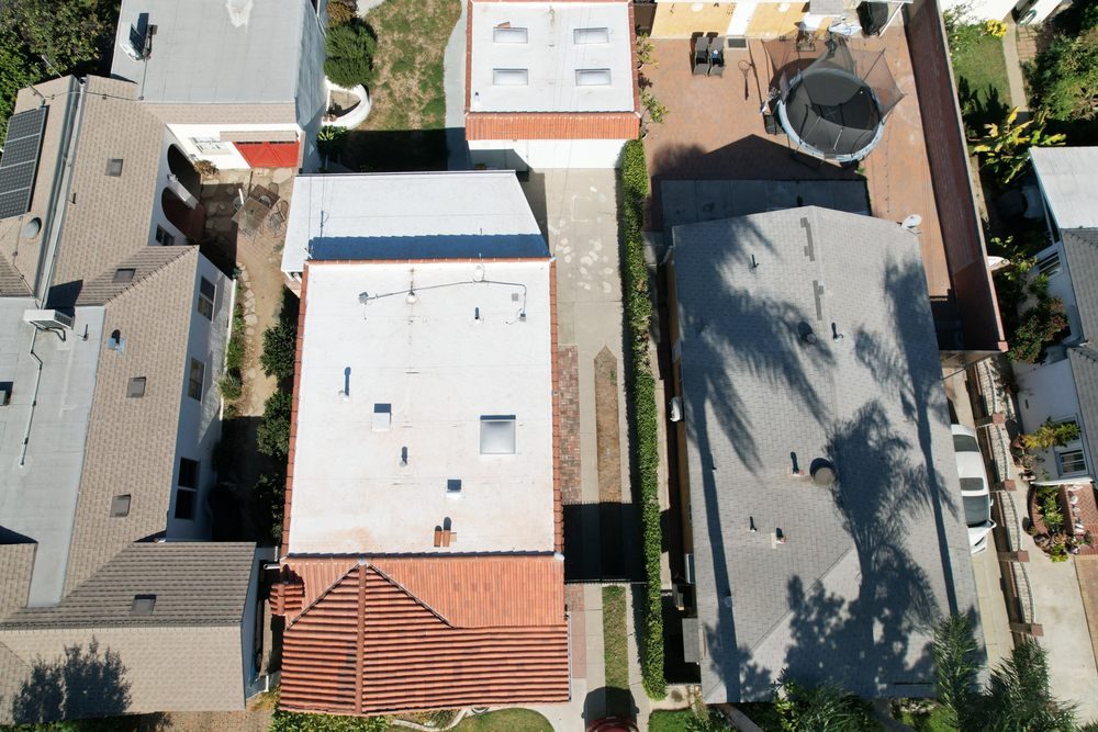 Slide of Enriquez Roofing