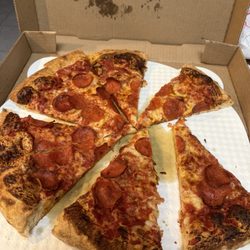 Some spots on pizza looks like fingers touched it,  because it was missing cheese.. it tasted OK, minus the charred areas on top.