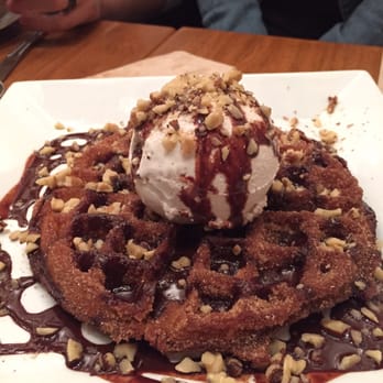 Seabirds Kitchen - CHAFFLE! $9 and worth it. a churro waffle topped with vanilla ice cream, chocolate sauce, and chopped pecans. - Vegan Near Me - Costa Mesa, California