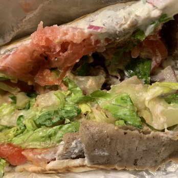 Greek Bites - Classic gyro pita. A little messy, but tasty. - Greek Near Me - Moriches, New York Greek Bites - Classic gyro pita. A little messy, but tasty. - Greek Near Me - Moriches, New York