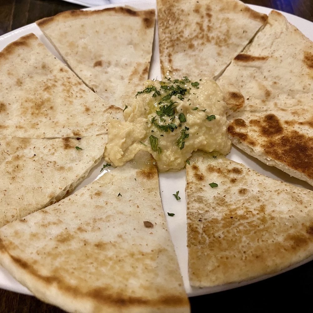Sparta Taverna - Complimentary pita bread with garlic hummus - Greek Near Me - Ridgefield Park, New Jersey
