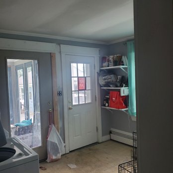 J Rich Builders - a view of a room with a door and a window - General Contractors Near Me - Fairfield, Maine J Rich Builders - a view of a room with a door and a window - General Contractors Near Me - Fairfield, Maine