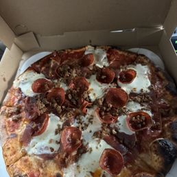 Bollo carne trio pizza ordered over the phone 10min away along with a GF pep pizza and a arugula salad.