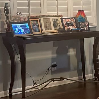 Clean Slate - Table that came from my moms with pictures and niknacks I was sure I had no room for. - Home Organization Near Me