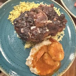 Oxtail and rice and stone shrimp & grits
