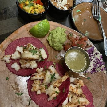 Chela’s Latin Cuisine - Shrimp tacos with beans and calabasitas as sides - Bars Near Me - Tucson, Arizona Chela’s Latin Cuisine - Shrimp tacos with beans and calabasitas as sides - Bars Near Me - Tucson, Arizona