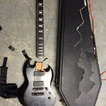 Aer Lingus - My destroyed guitar from flying Aer Lingus from Dublin to Chicago on Septermber 2nd, 2014. - Airlines Near Me - Dublin, D