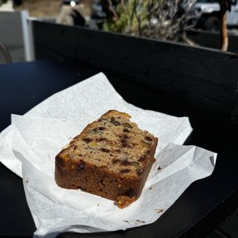 Soul Grind Coffee Roasters - The Banana Chocolate Walnut Bread (sorry I couldn't help taking a pre-picture bite.) *it is that good* - Coffee & Tea Near Me - Pacifica, California Soul Grind Coffee Roasters - The Banana Chocolate Walnut Bread (sorry I couldn't help taking a pre-picture bite.) *it is that good* - Coffee & Tea Near Me - Pacifica, California