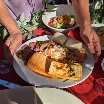 Michi's Catering - Michi serving us our food first so we can go around the tables :) - Caterers Near Me - Campbell, California