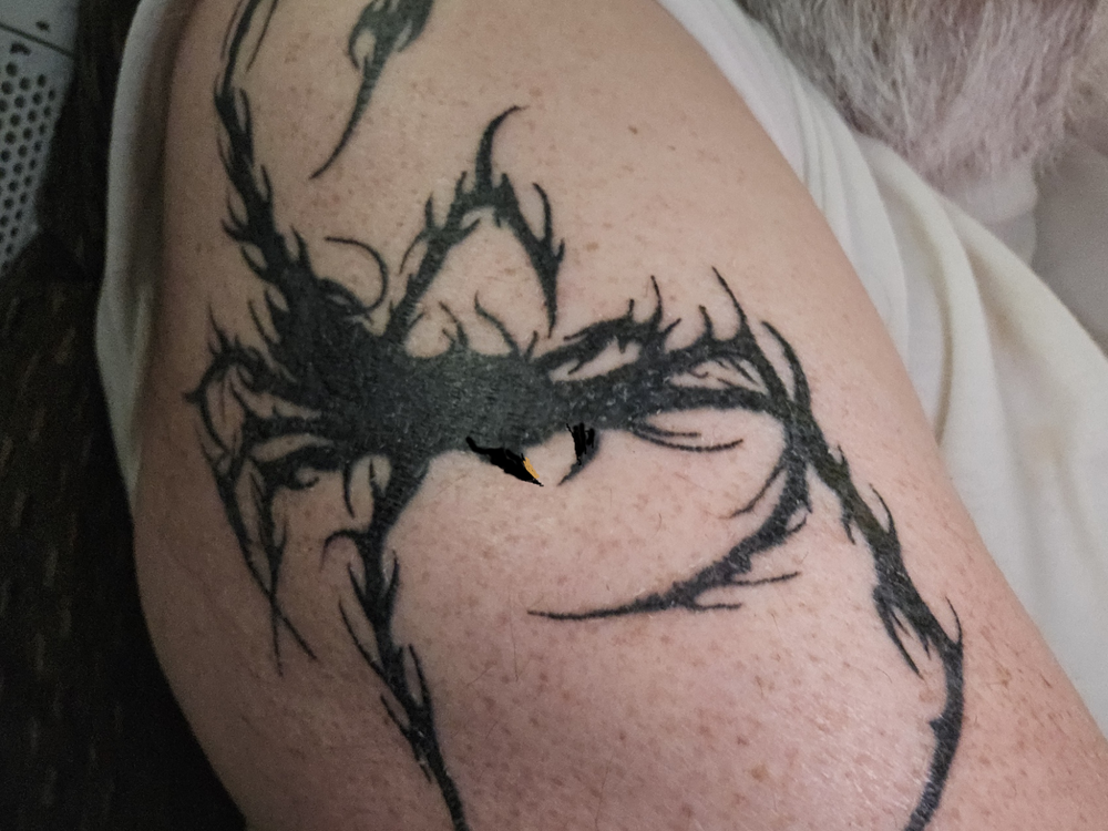 The Zone Tattoo & Body Piercing Logo