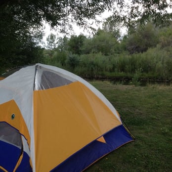 Dillon KOA - Loving this KOA!  Greeted oh so friendly and our site is right on the water for easy fishing.  Also under a nice big tree!!! - RV Parks Near Me - Dillon, Montana