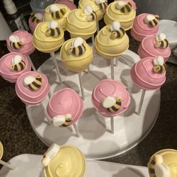 Life of the Party Cake Design - We love bees! (the sugar bees are the best!) These delicious cake pop "hives" were created for a fun bee-themed First Birthday!