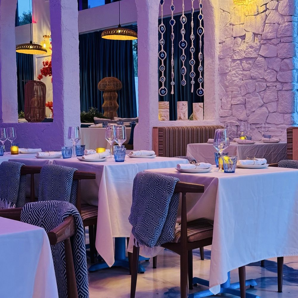 Elia - Nice touch with the throw on the back of the chairs. - Mediterranean Near Me - Campbell, California