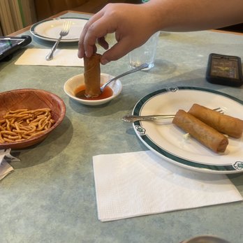New Peking Restaurant - Dip the egg roll in sweet and sour sauce yummy - Chinese Near Me - Cerritos, California New Peking Restaurant - Dip the egg roll in sweet and sour sauce yummy - Chinese Near Me - Cerritos, California