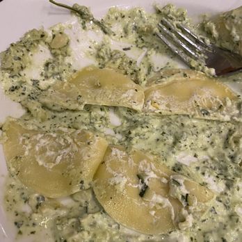 Remingtons At the Bridges - Two raviolis split open to reveal very slight ricotta filling with tiny chunks of zucchini. No butternut squash as stated on the menu. - Seafood Near Me - Montrose, Colorado Remingtons At the Bridges - Two raviolis split open to reveal very slight ricotta filling with tiny chunks of zucchini. No butternut squash as stated on the menu. - Seafood Near Me - Montrose, Colorado