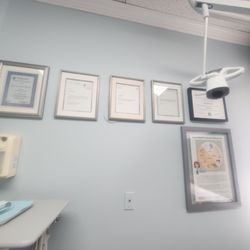 Jin Y. Kim, DDS, MPH, MS, FACD - Plaques from recommended organizations and awards received.