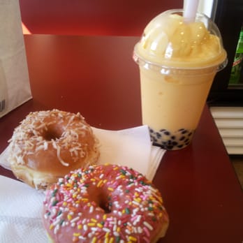 BoSa Donuts - Toasted coconut and pink sprinkle with a mango boba smoothie. Yum!!! :-) - Donuts Near Me - Phoenix, Arizona BoSa Donuts - Toasted coconut and pink sprinkle with a mango boba smoothie. Yum!!! :-) - Donuts Near Me - Phoenix, Arizona