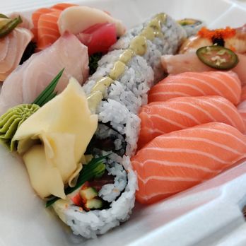Hiroi Sushi - Salmon Nigiri on the right. - Sushi Bars Near Me - Mississauga, Ontario