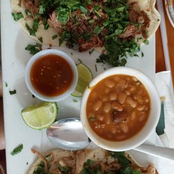 Los Altos Mexican Restaurant - Beef Barrio and carnitas Street Tacos with beans.