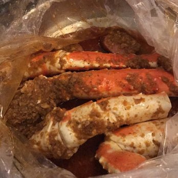 Madison Crab House - King Crab legs with Sausage and Garlic Butter Sauce - Cajun/Creole Near Me - Chicago, Illinois Madison Crab House - King Crab legs with Sausage and Garlic Butter Sauce - Cajun/Creole Near Me - Chicago, Illinois