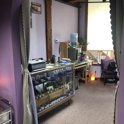 Purple Sarah - Retail area and side of waiting room.