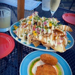 Blue Eyed Crab Caribbean Grill & Rum Bar - Jerk chicken nachos & crab cakes