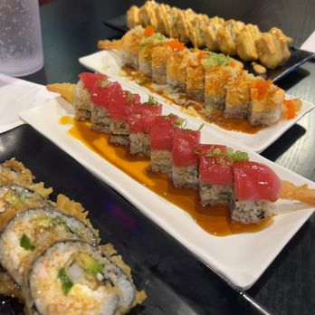 Sushi Joint - Left to right ; Cheese Ebi Roll, Norwalk Roll, Holiday Roll, Special California Roll - Sushi Bars Near Me - Norwalk, California