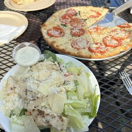 Salad with chicken, margherita pizza Salad with chicken, margherita pizza