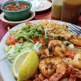Grilled shrimp with peppers and onions, rice, beans, guac. Super delicious and authentic-tasting! Grilled shrimp with peppers and onions, rice, beans, guac. Super delicious and authentic-tasting!
