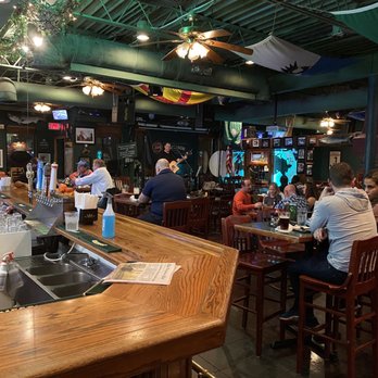 Murphy’s Irish Pub - people sitting at the bar - Irish Near Me - Virginia Beach, Virginia
