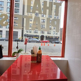 thai plates - Interior by the window - Thai Near Me - Jersey City, New Jersey