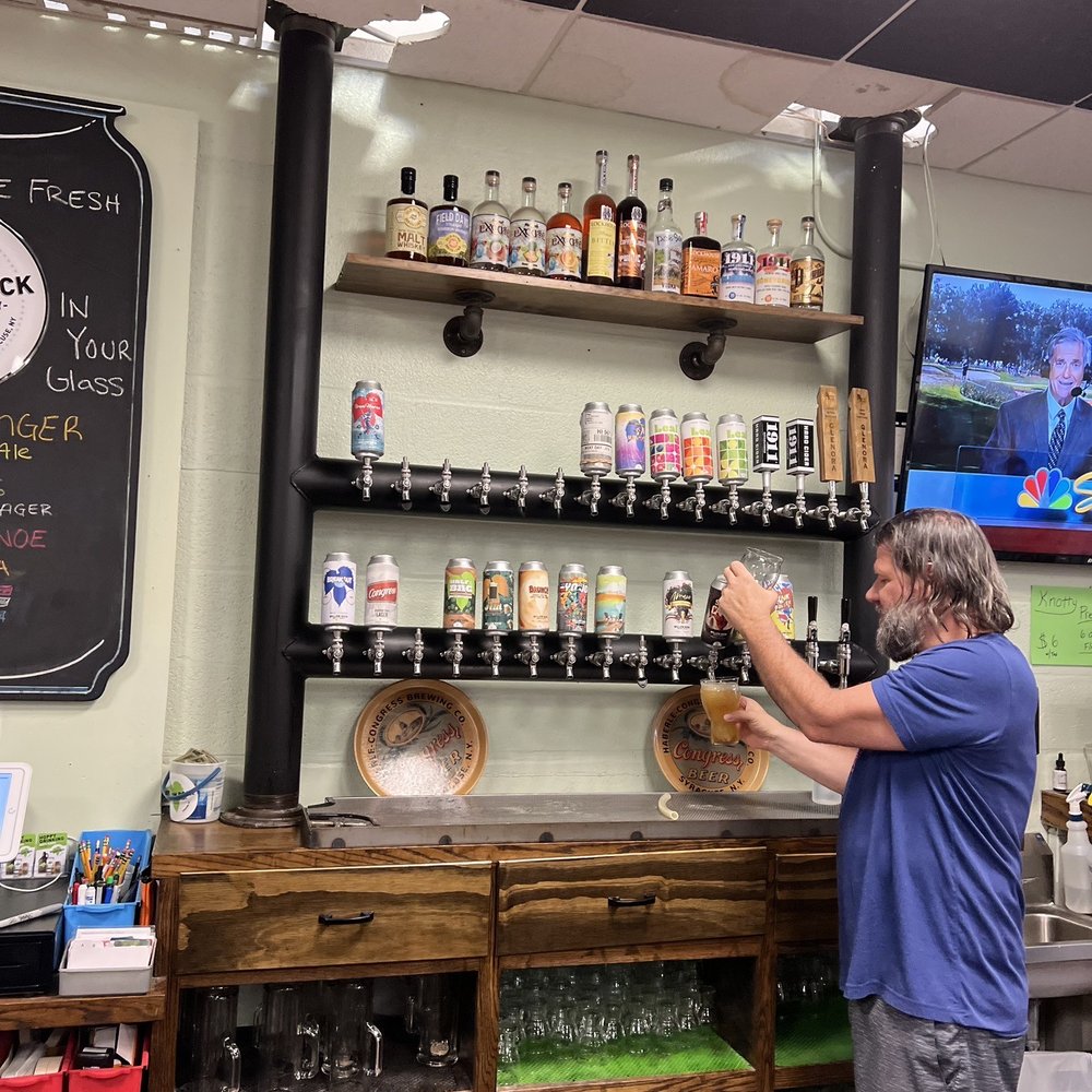 Willow Rock Brewing Company - a man pouring a beer - Breweries Near Me - Syracuse, New York Willow Rock Brewing Company - a man pouring a beer - Breweries Near Me - Syracuse, New York