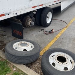 Smith Truck & Trailer Repair - Putting on new trailer tires for customer.