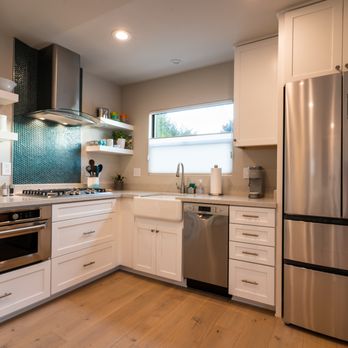 Gregory James - a kitchen with stainless steel appliances - General Contractors Near Me - Carlsbad, California Gregory James - a kitchen with stainless steel appliances - General Contractors Near Me - Carlsbad, California