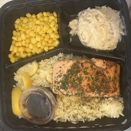 Grilled Salmon (sauce on side) over rice, mashed potatoes, corn Grilled Salmon (sauce on side) over rice, mashed potatoes, corn