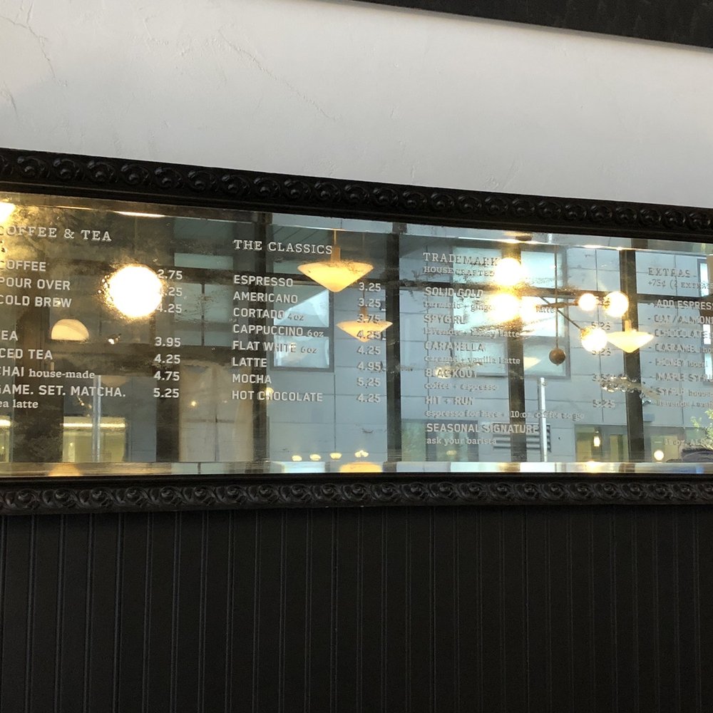 Spyhouse Coffee Roasters - Mirrored menu on the wall. - Coffee & Tea Near Me - Minneapolis, Minnesota Spyhouse Coffee Roasters - Mirrored menu on the wall. - Coffee & Tea Near Me - Minneapolis, Minnesota
