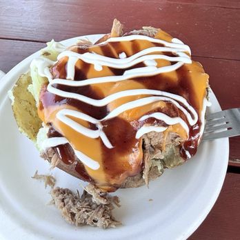 Bradley's Pit Barbecue & Grill - Pulled pork piggy on a potato - Barbeque Near Me - Sweetwater, Tennessee Bradley's Pit Barbecue & Grill - Pulled pork piggy on a potato - Barbeque Near Me - Sweetwater, Tennessee