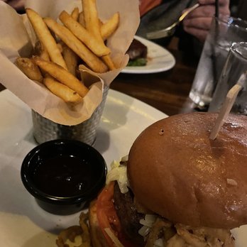 The Foundry - Hamburger with barbecue sauce and onion rings on top - Lounges Near Me - Pompano Beach, Florida
