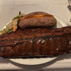 Elegant Bull Restaurant - Rack of ribs, veggies, sweet potato.