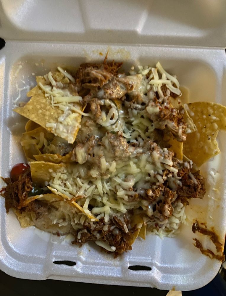Rico's Tacos - Adel Logo