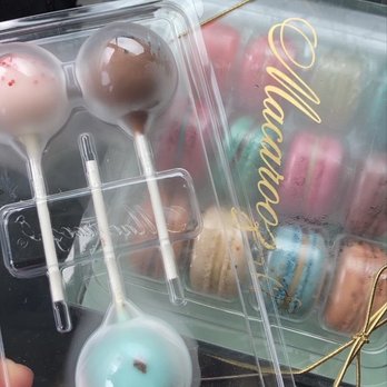 Macarooz - a person holding a box of macaroons - Macarons Near Me - Cypress, Texas Macarooz - a person holding a box of macaroons - Macarons Near Me - Cypress, Texas
