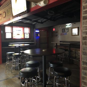 Da Babooze Bar - a row of bar stools - Bars Near Me - Wailuku, Hawaii Da Babooze Bar - a row of bar stools - Bars Near Me - Wailuku, Hawaii